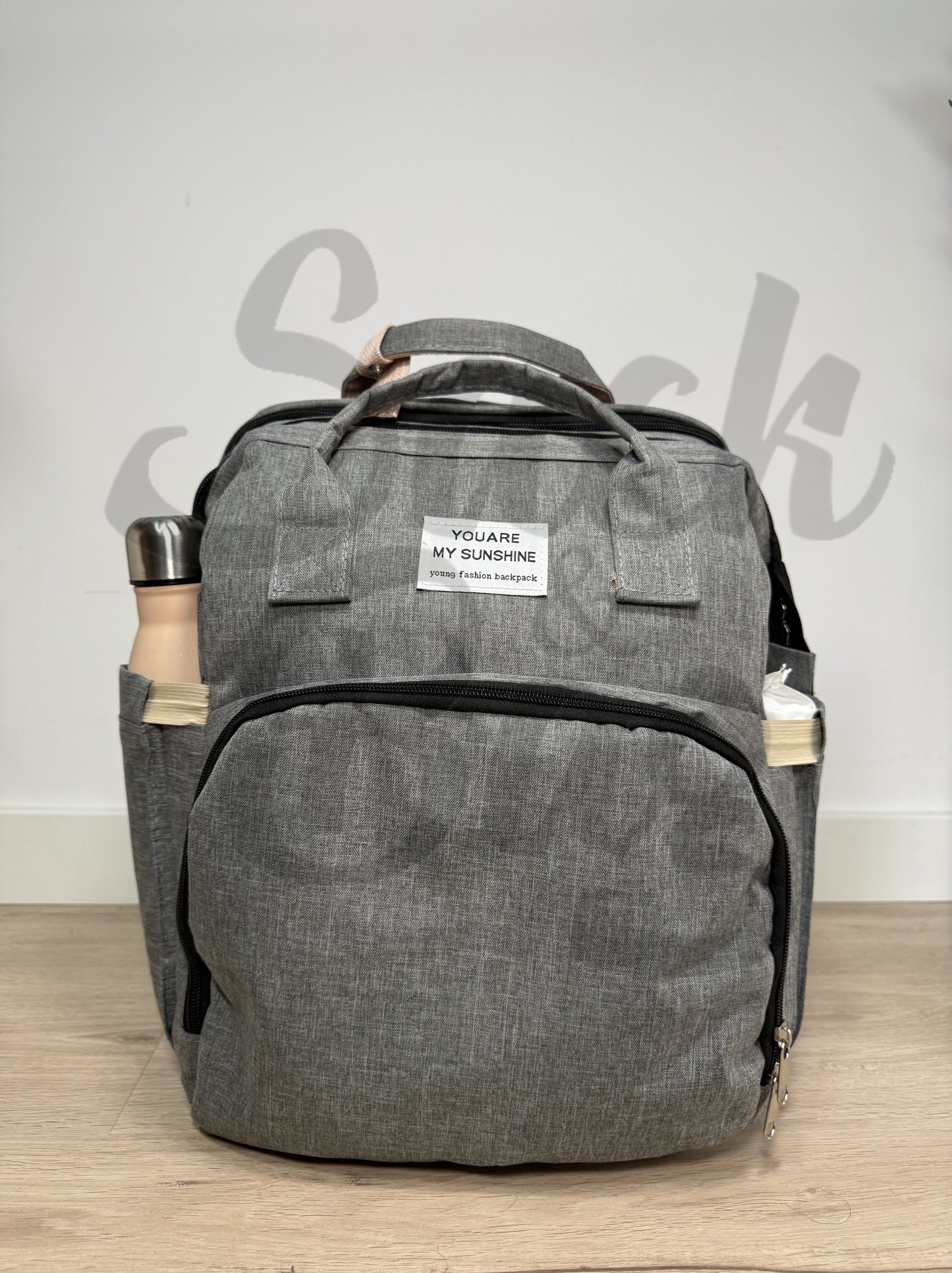 Mochila cambiador bebé con compartimento para toallitas y botella de agua