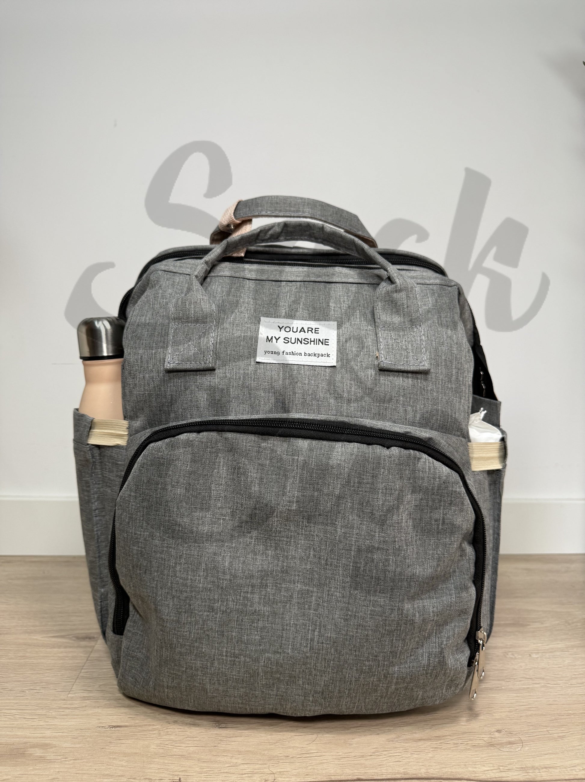 Mochila cambiador bebé con compartimento para toallitas y botella de agua