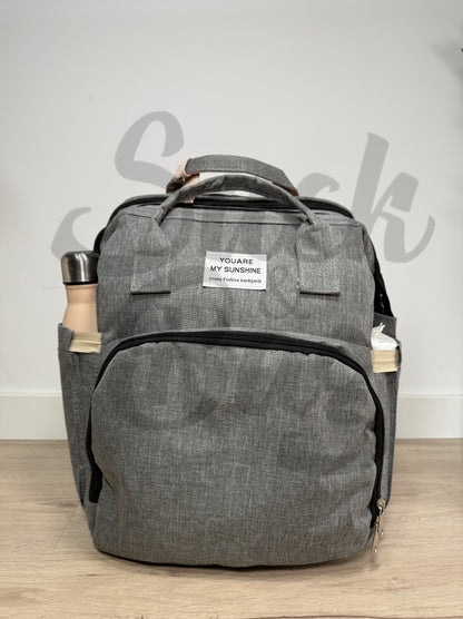Mochila cambiador bebé con compartimento para toallitas y botella de agua
