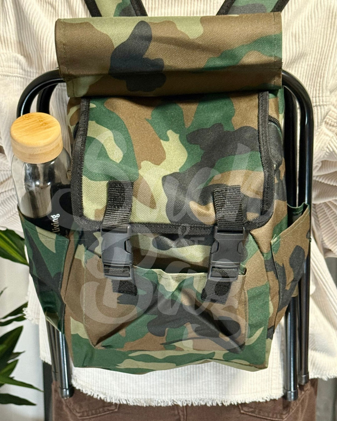 Mochila cambiador con silla plegable integrada y bolsillo térmico portátil